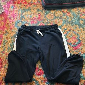Black joggers with white straight down each side size large